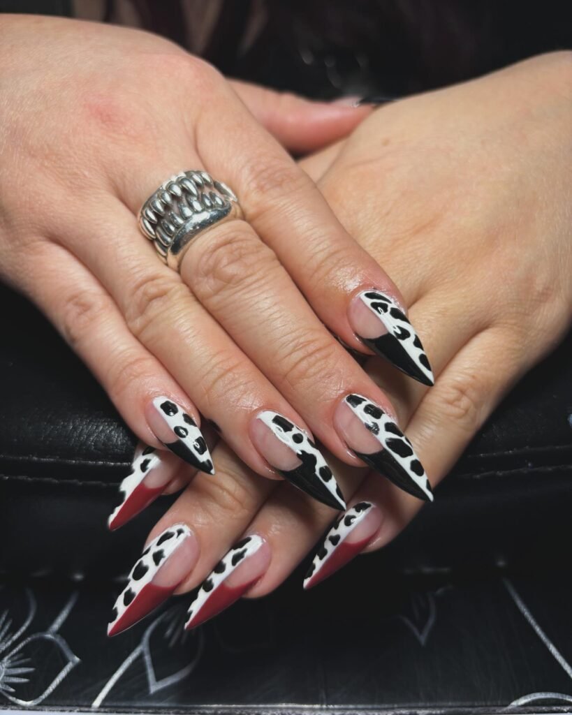 Black base with bright cream and mint accents by nails_by_bravo22