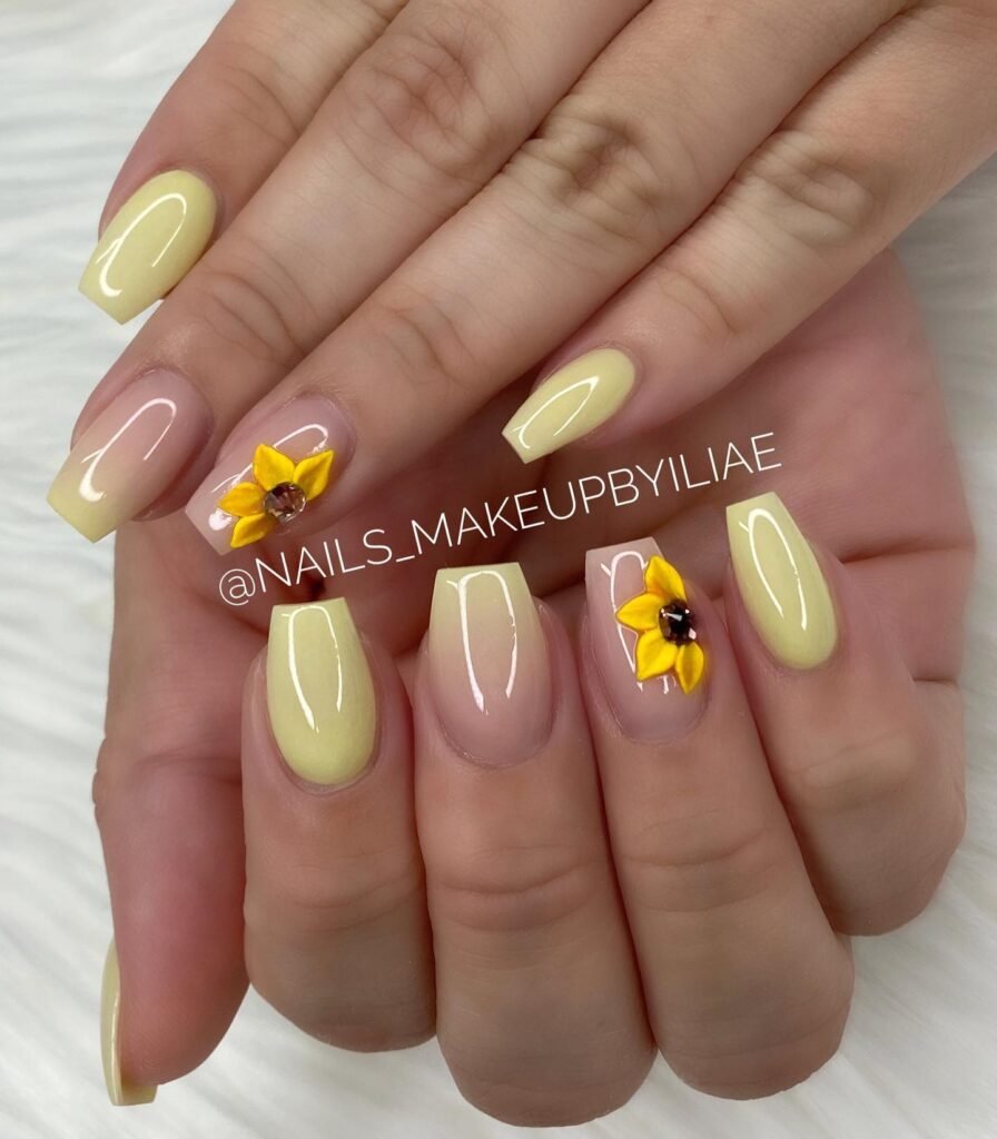Bright sunflower yellow with small flower decals by nailsbyilia.enid