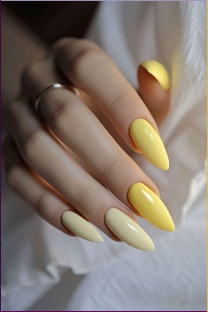 Bright yellow manicure on natural nails with glossy finish by nailbeautyguide