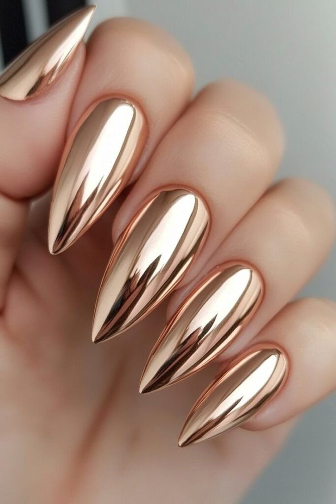 Chrome mirror yellow nails with reflective finish by nailbeautyguide