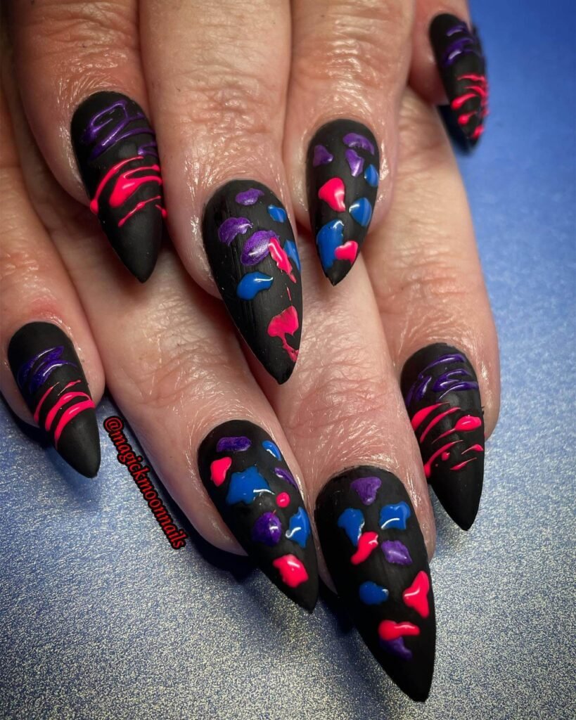 Colorful paint splatter nails with art supplies by magickmoonnails