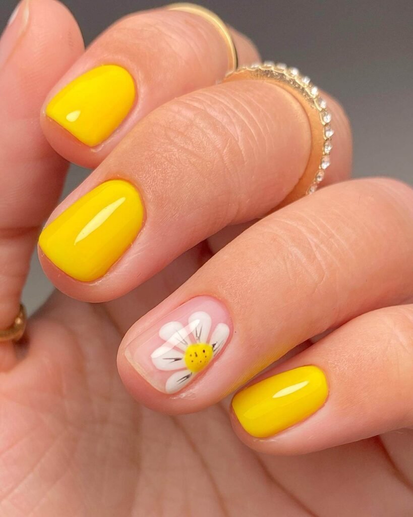 Daffodil bloom nails with spring garden by sophiezaramanicurist