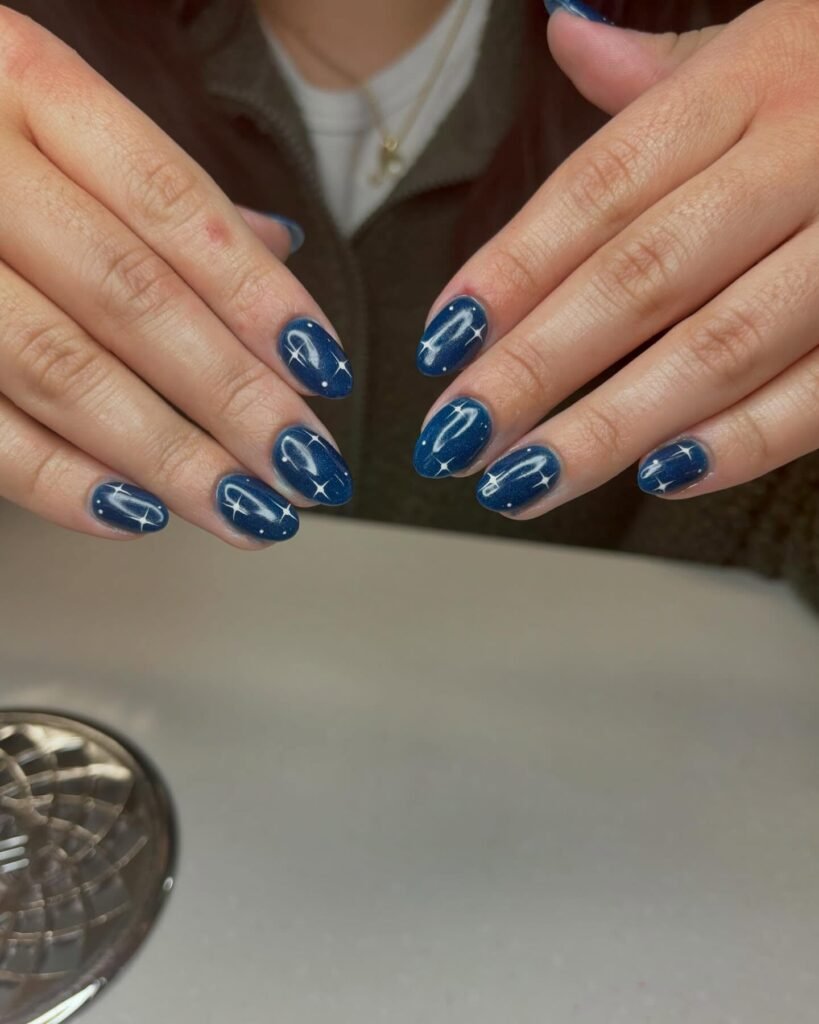 Dark background with cosmic-colored swirling patterns by jennysnails1003