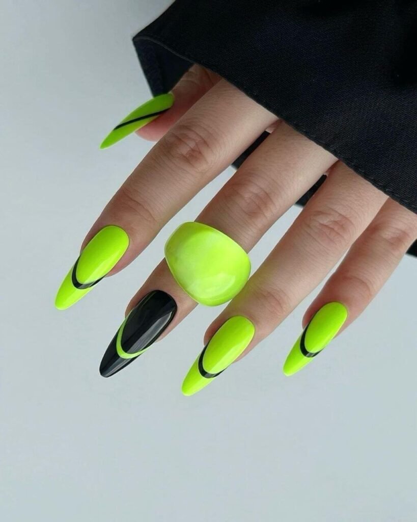 Electric neon abstract nails under blacklight by nailbeautyguide