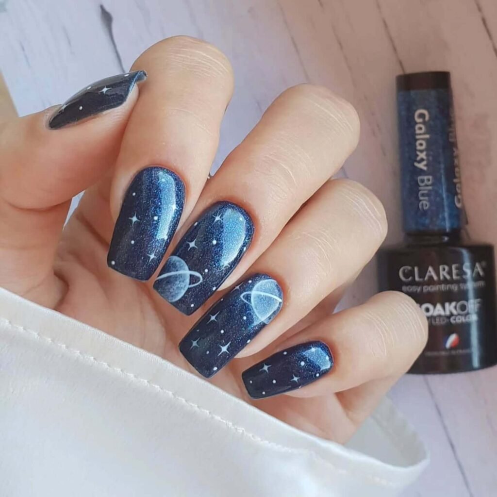 Galaxy swirl nails with cosmic glitter by shelovesnailss