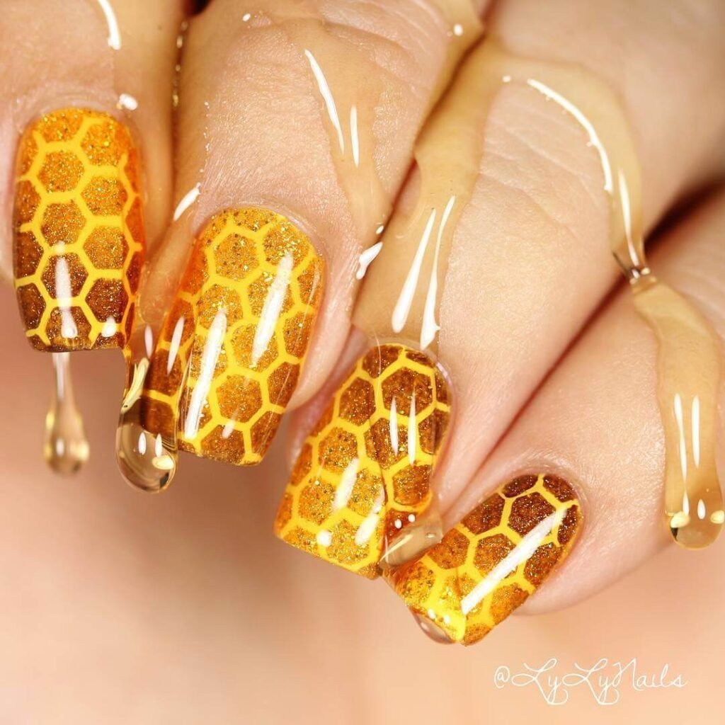 Honey drip nails with golden accents by whatsupnails