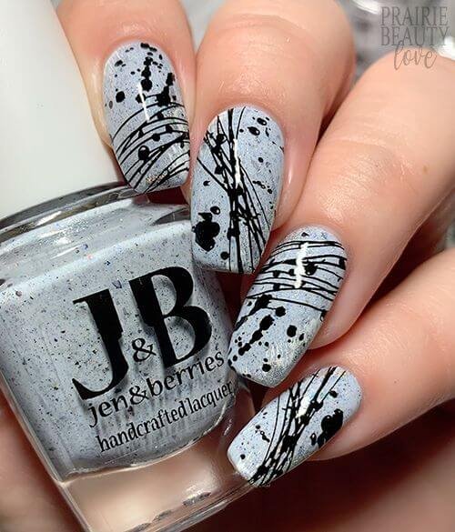 Ink blot pattern nails with dark splatters by nailbeautyguide