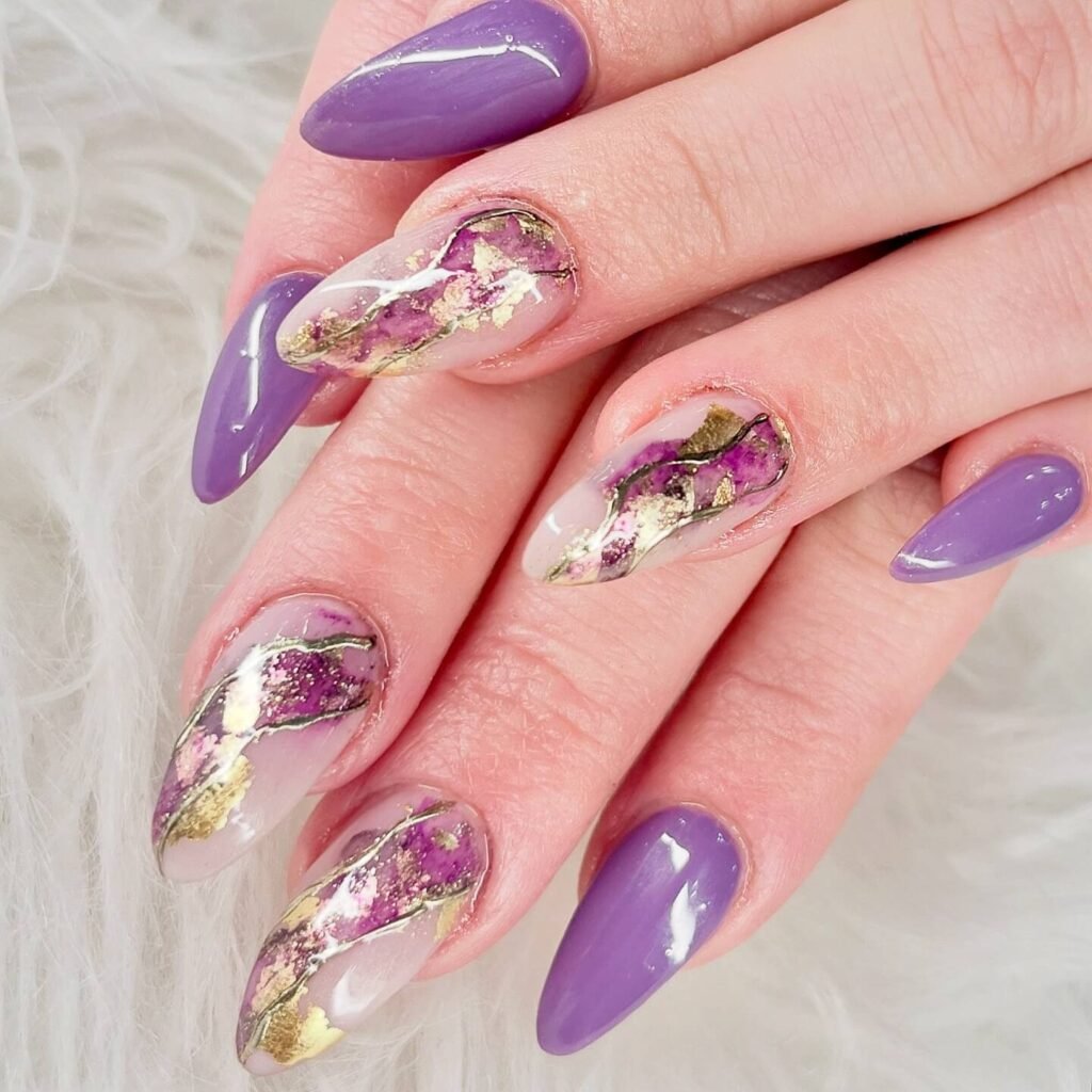 Lavender nails with metallic gold flakes by x.amy_nguyen