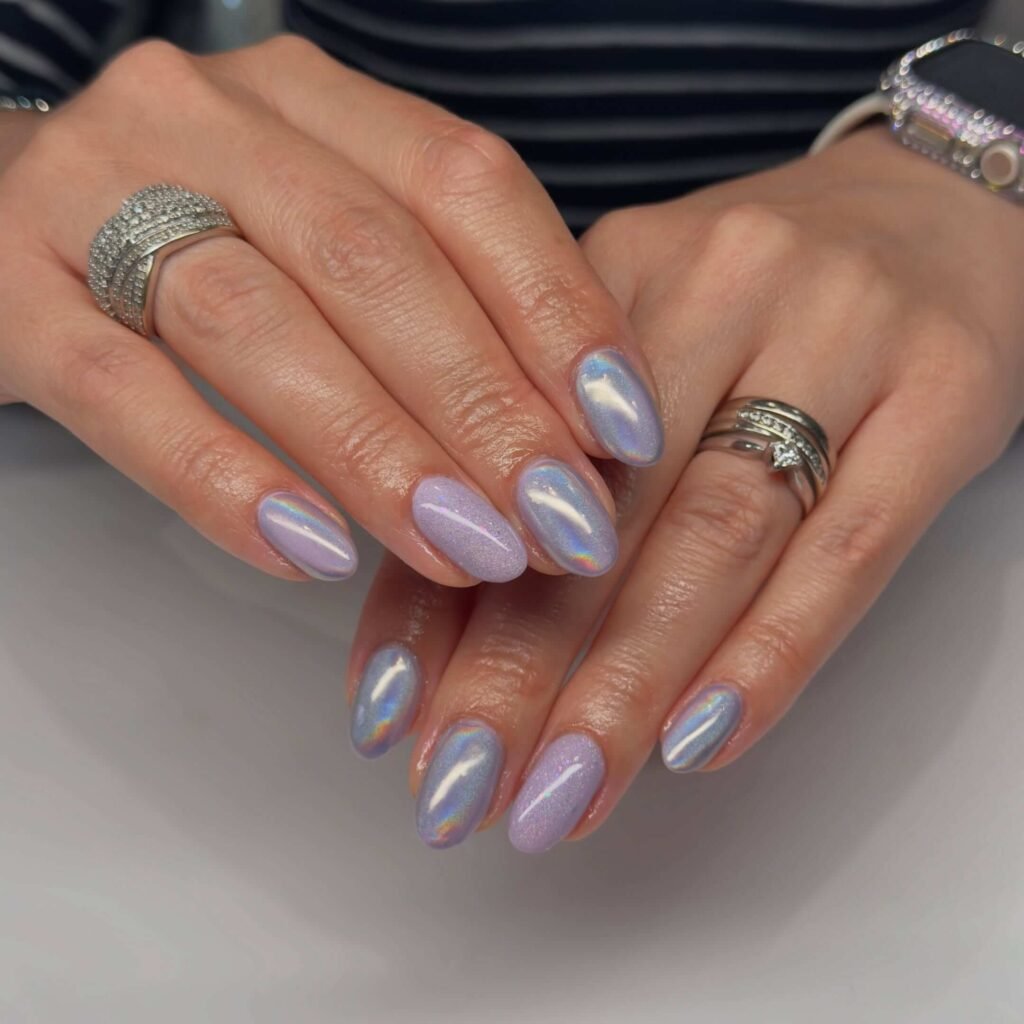 Lilac nails with holographic shine by theavenuehairandnails