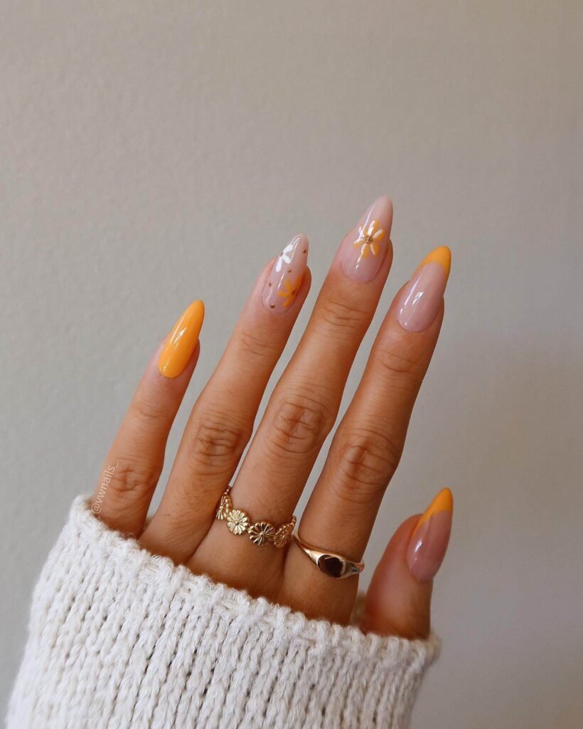 Marigold burst nails with autumn flowers by vivianmariewong
