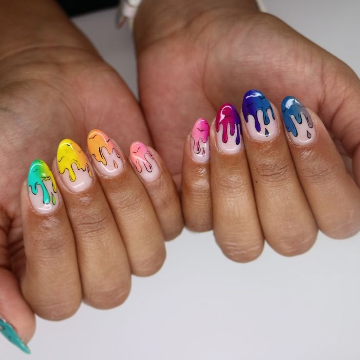 Melted crayon drip nails with rainbow colors by nailbeautyguide