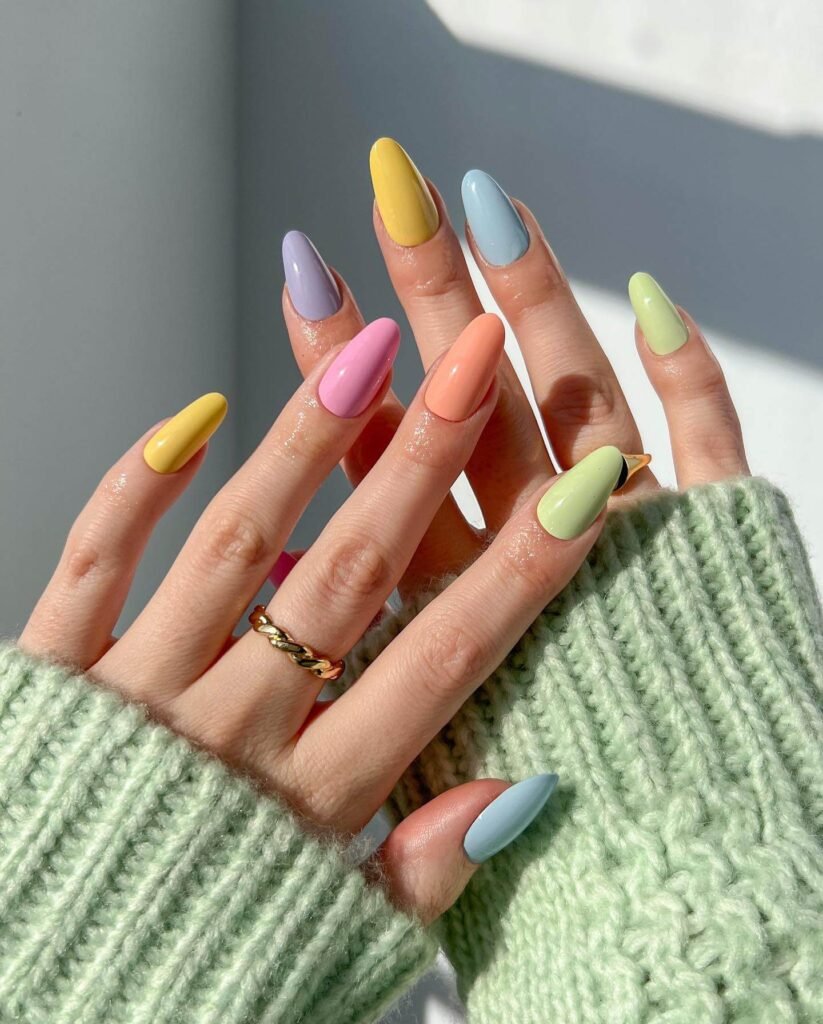 Pastel rainbow nails with glossy finish by pop_polished