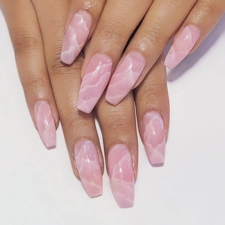 Pink marble nails with subtle swirls by nailbeautyguide