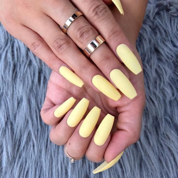 Soft butter yellow nails with matte topcoat by nailbeautyguide