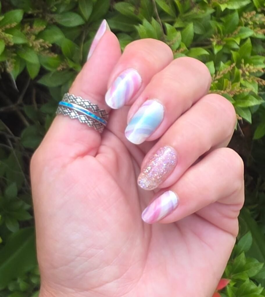 Soft pastel rainbow in swirling patterns by traveling.hues