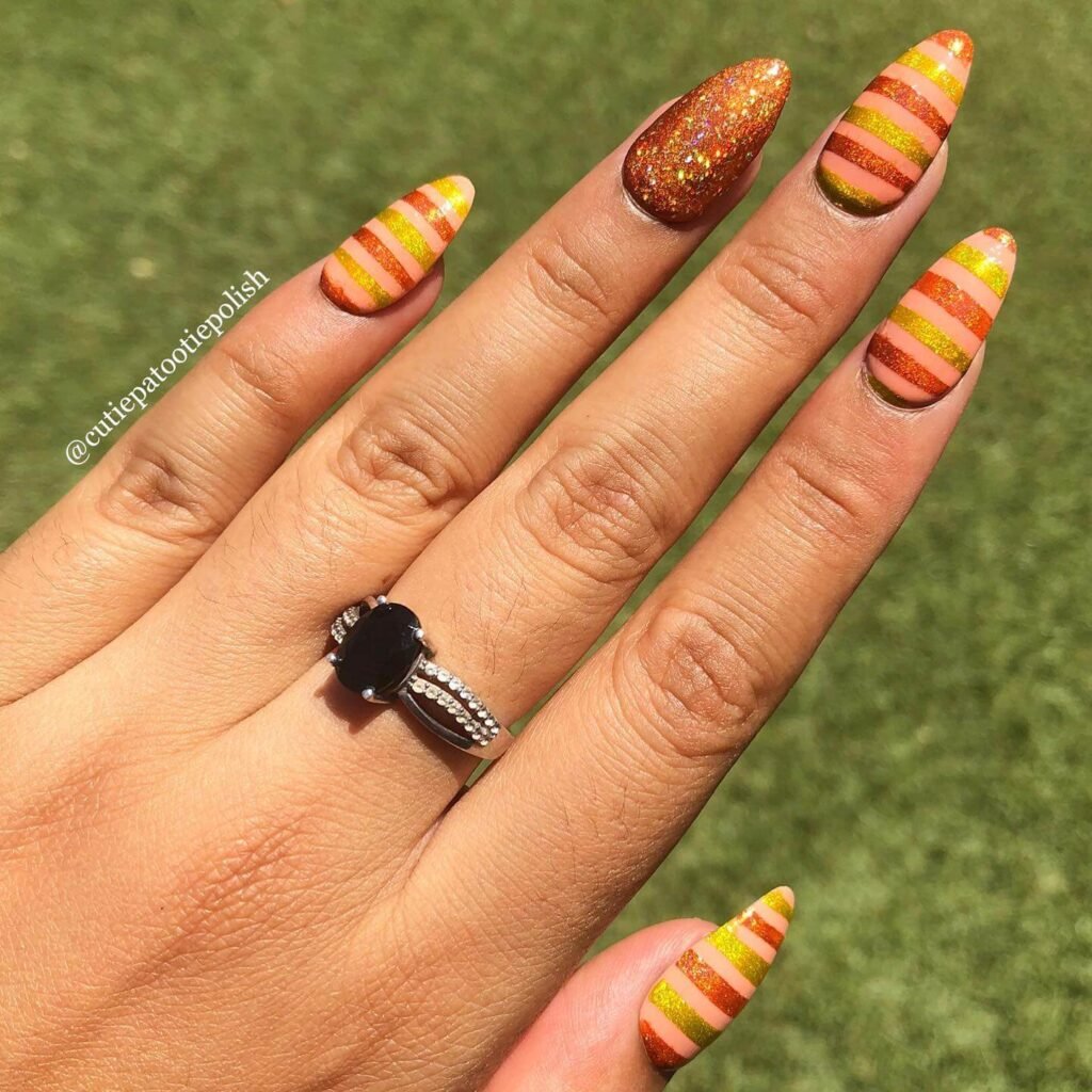 Striped taxi yellow nails with city backdrop by cutiepatootiepolish