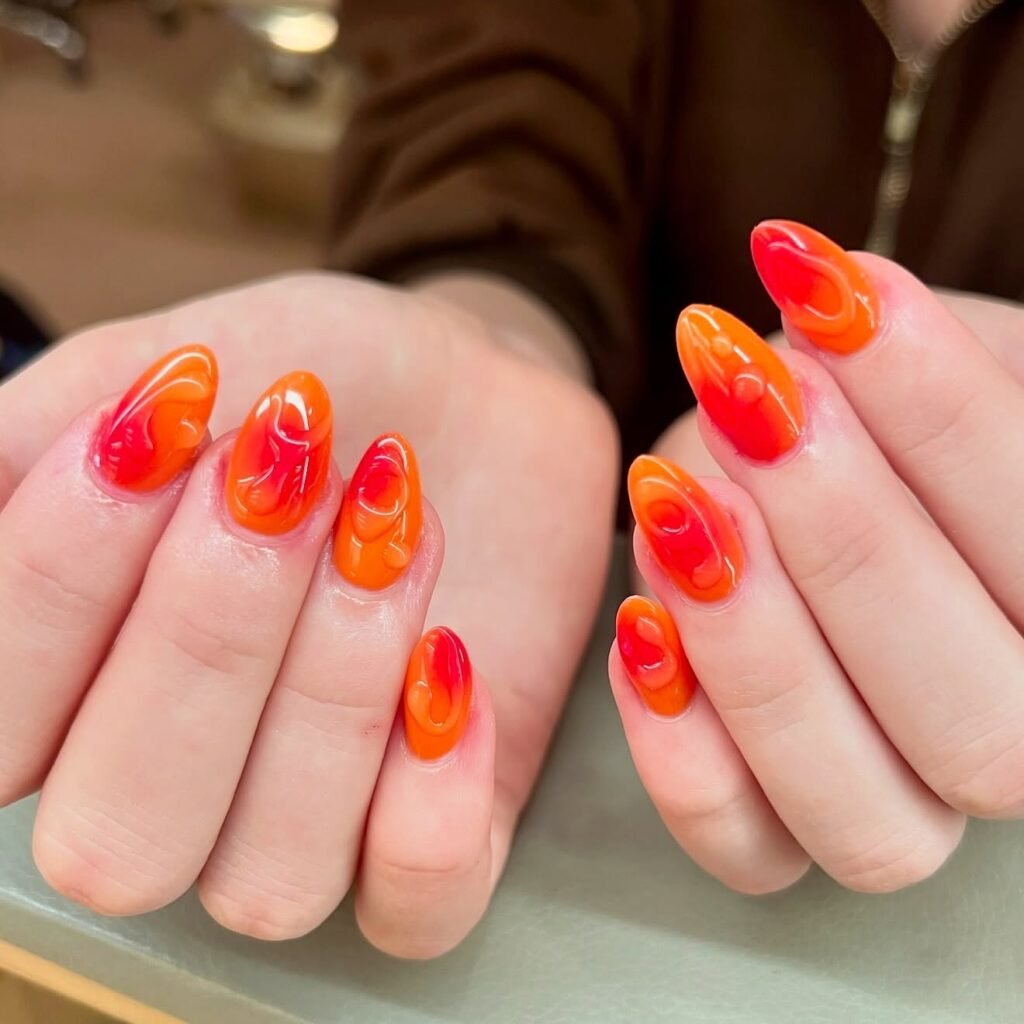 Warm reds and oranges in flowing wave designs by naillington