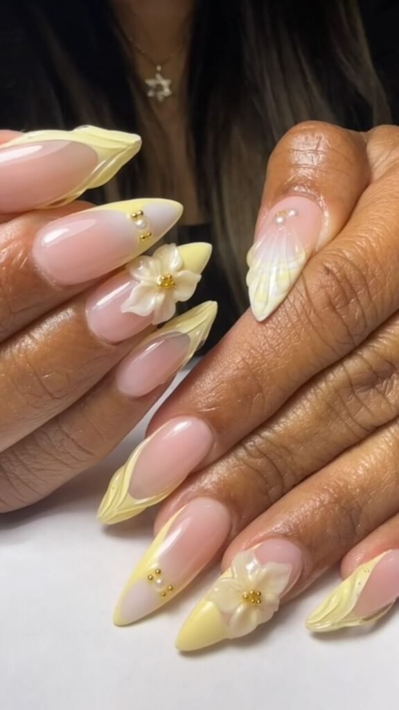 Wave pattern nails with corn silk theme by ac_nailsnorthmiami