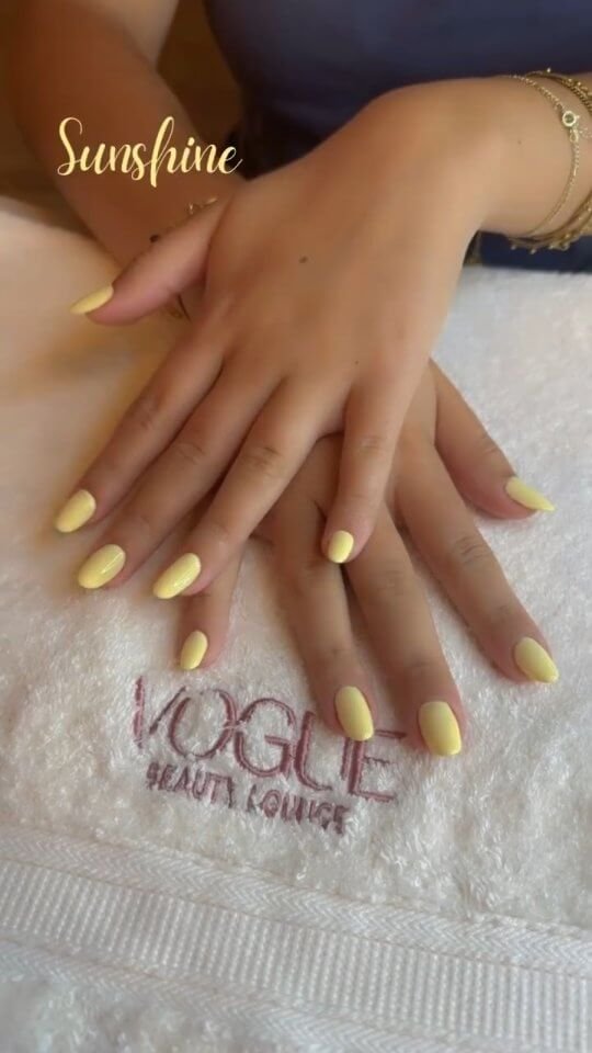 Yellow gradient nails with sunflowers by lavogueabudhabi