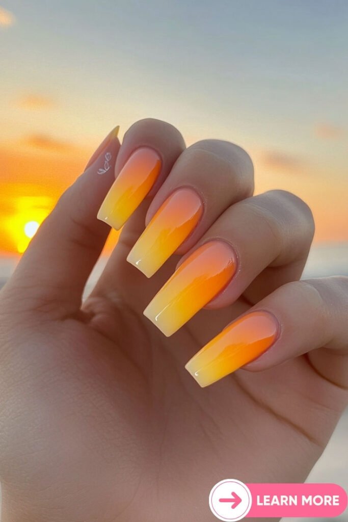 Yellow to orange gradient nails mimicking sunset by nailbeautyguide
