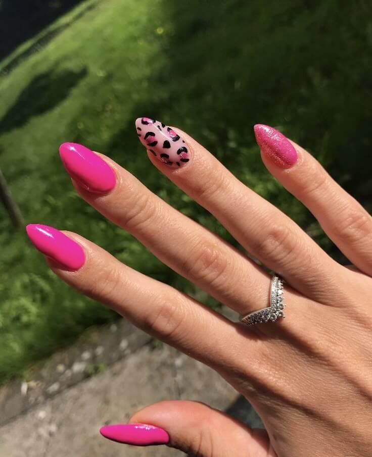 Animal print nails styled with bold accessories by nailbeautyguide
