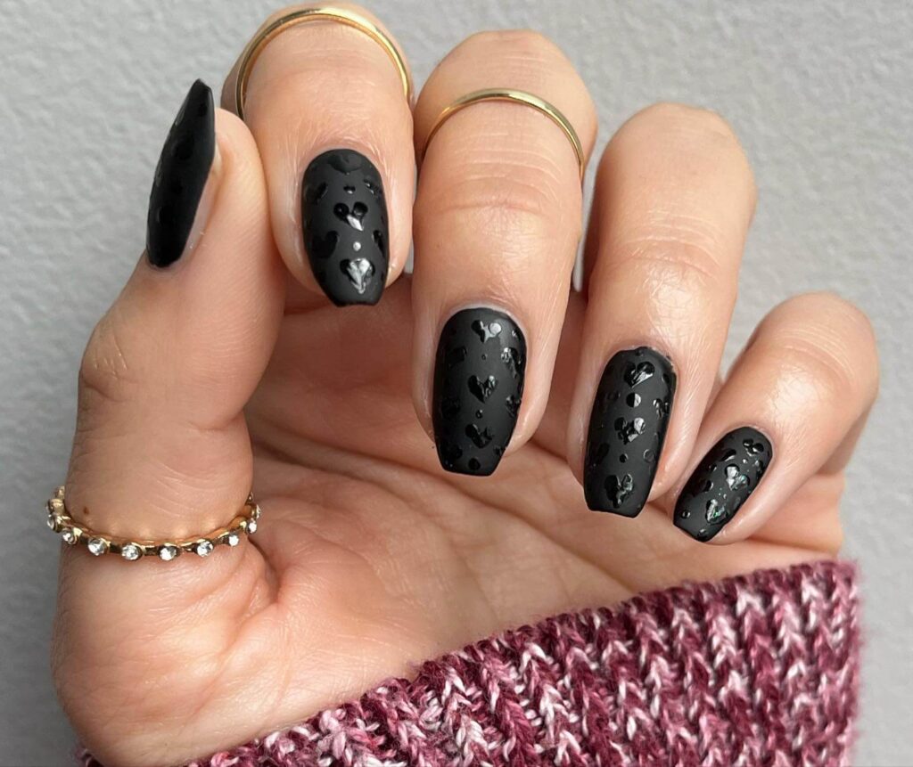 Bold and edgy matte black ballerina nails by polishedbookworm