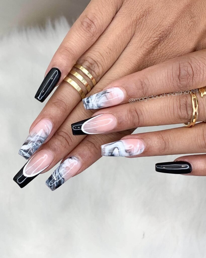 Coffin nails with gray marble base and black tips by magictouchnailshayes