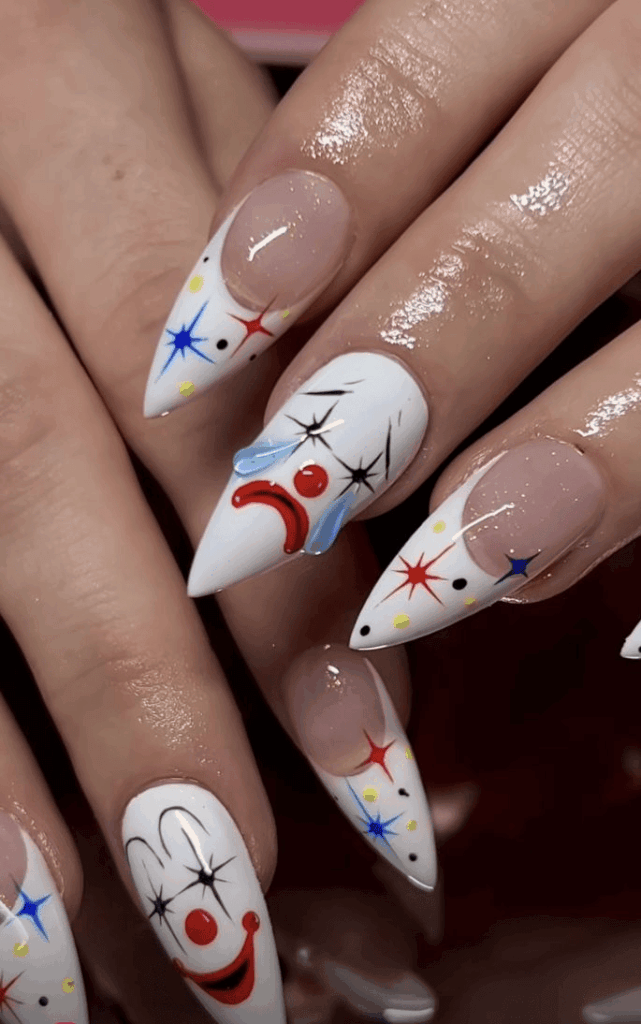 Creepy clown smile Halloween nails by nailbeautyguide