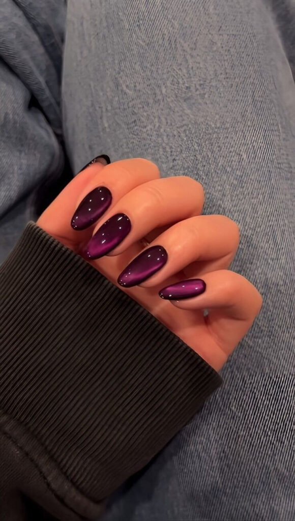 Dark purple October nails with bold, mystical tones by nailbeautyguide