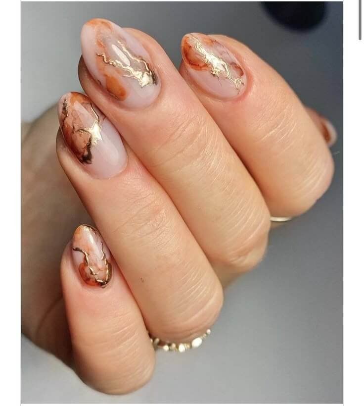 Deep neutral base with copper foil highlights by  nailbeautyguide