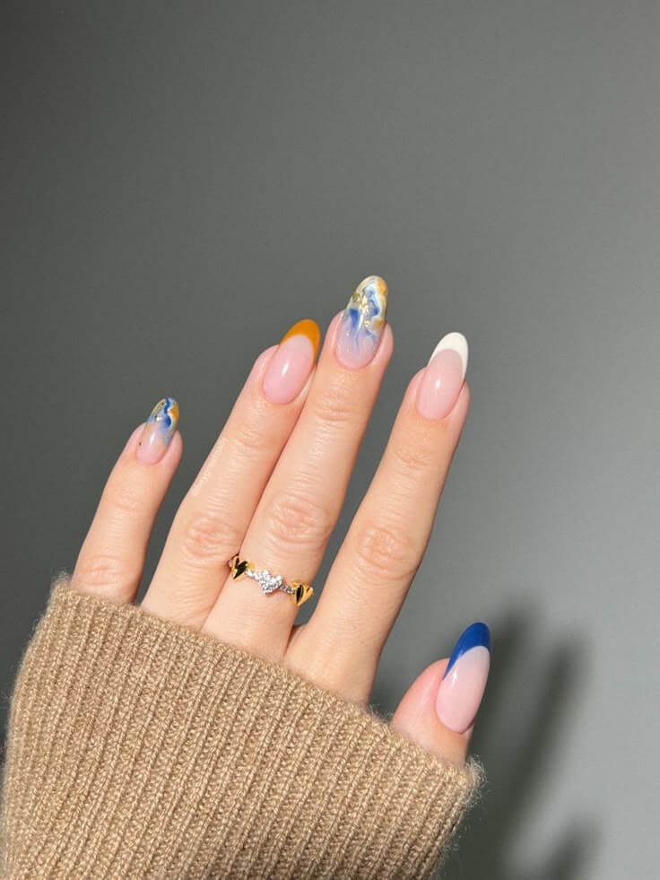 Fall skittle french with mixed autumn colors by nailbeautyguide