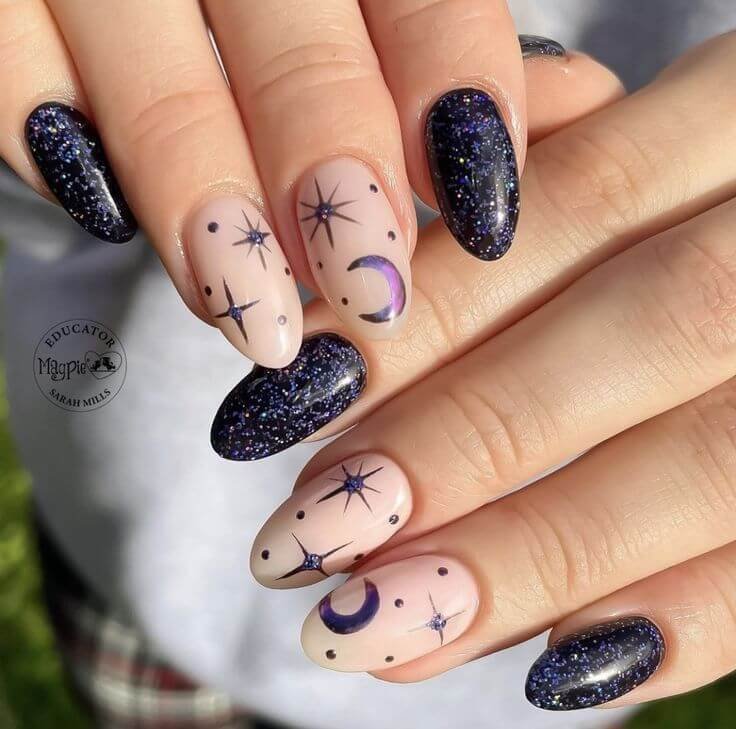 Galaxy themed Halloween nails by nailbeautyguide