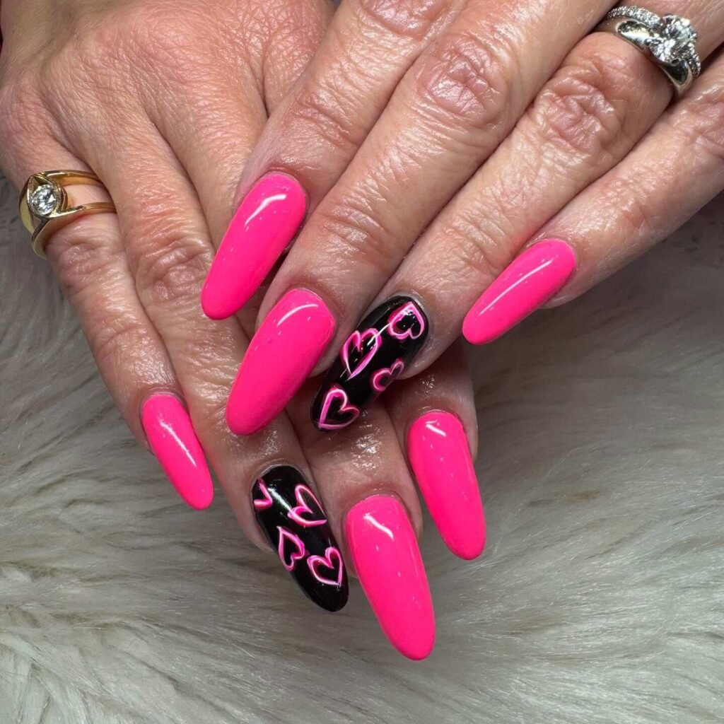Heart nails styled with heart-shaped props by leahtruong