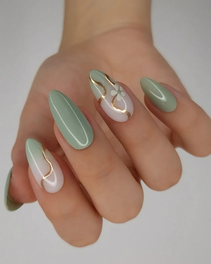 Medium-length coffin nails painted with matte sage polish by nailbeautyguide