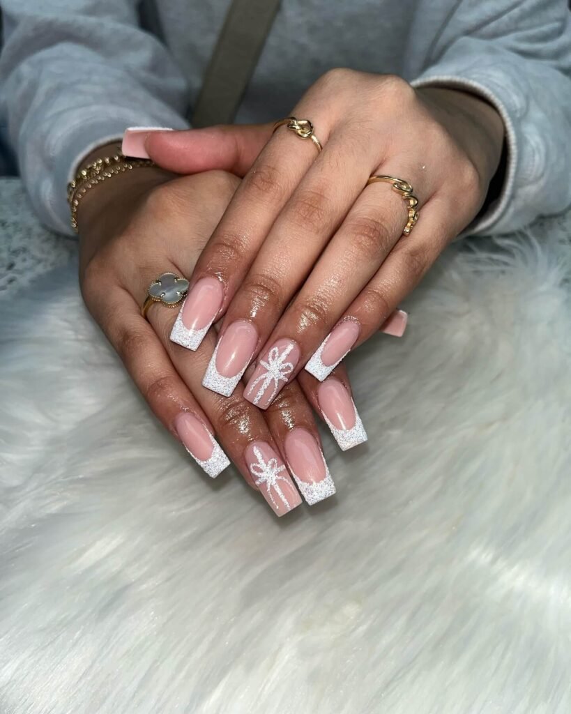Nude October nails with glitter tips for a soft shine by nailsclubpasadena