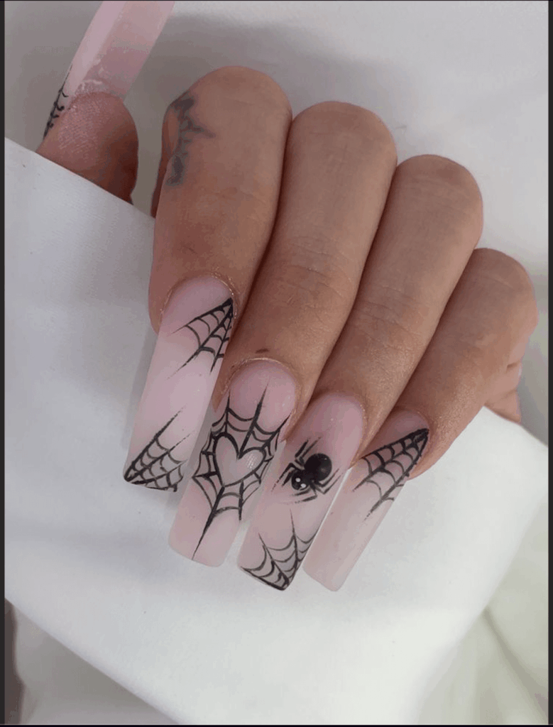 October nails with spider web Halloween-inspired design by nailbeautyguide