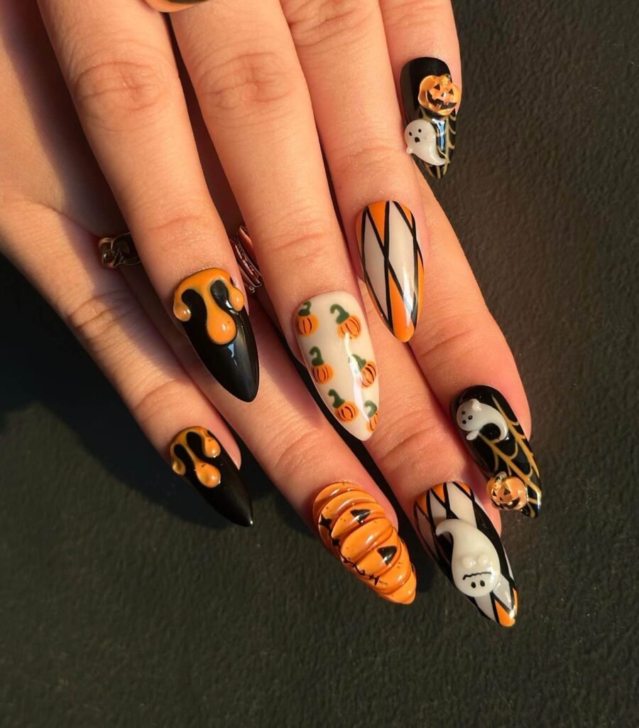 Orange and black pumpkin silhouette Halloween nails by cindydory01