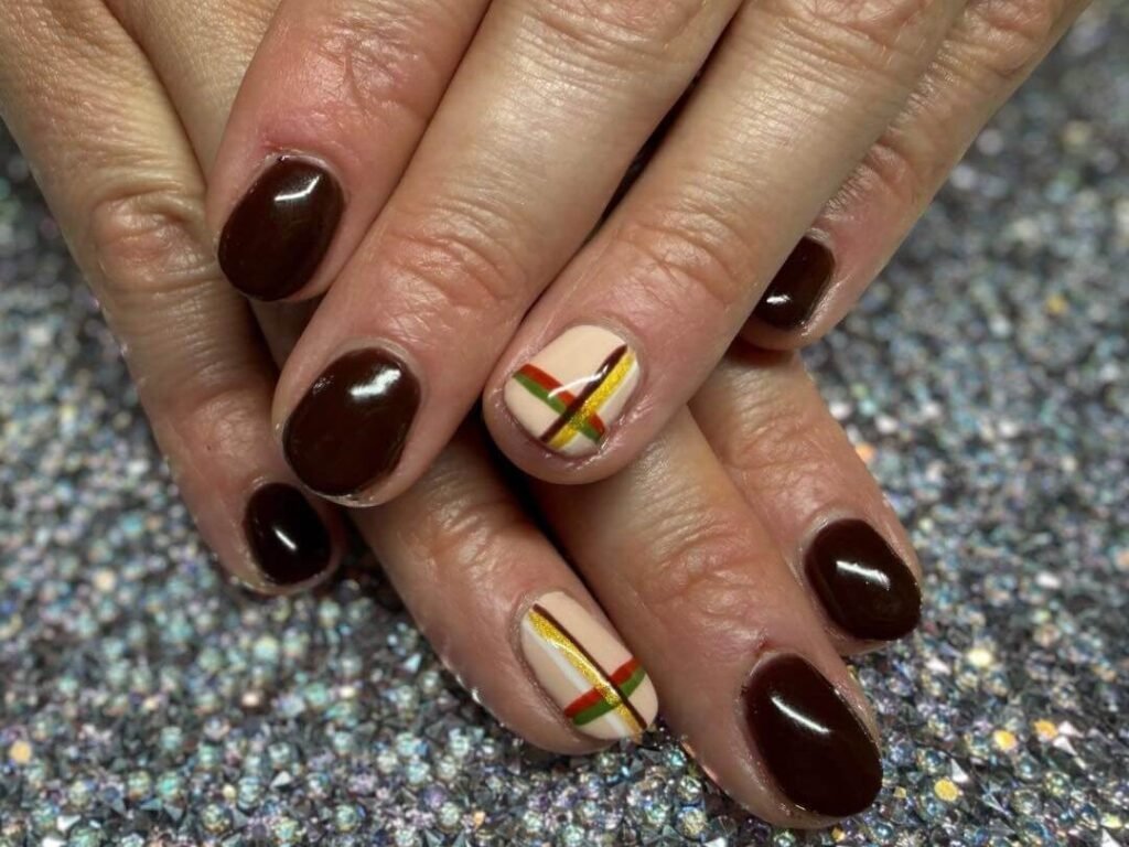 Plaid accent nail with caramel and burgundy by michelleshairboutique