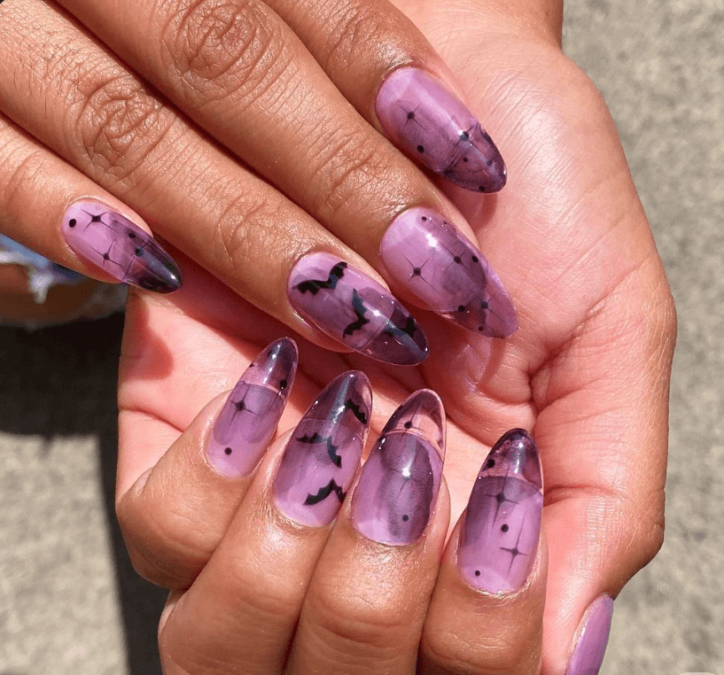 Purple aura metallic foil Halloween nails by nailbeautyguide