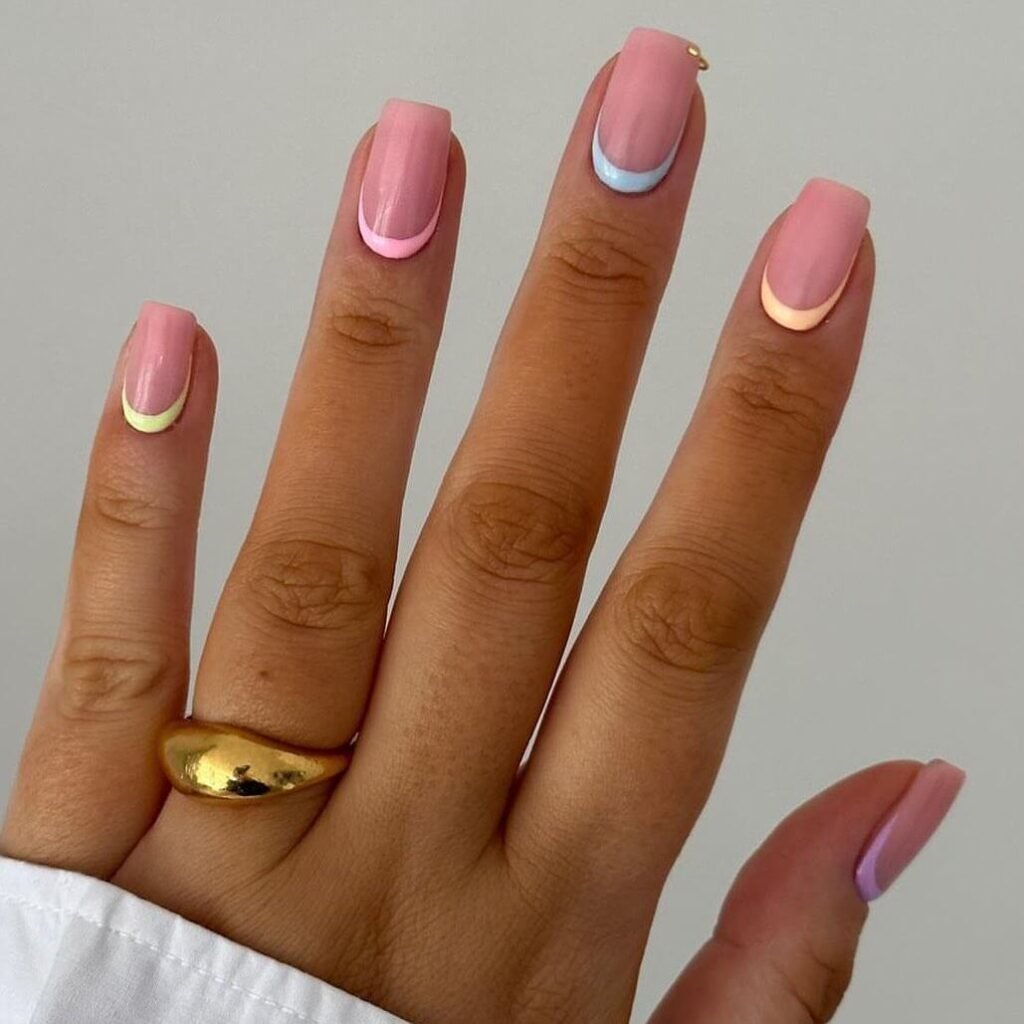 Reverse French tips styled with minimalist jewelry by nailtoepiamt