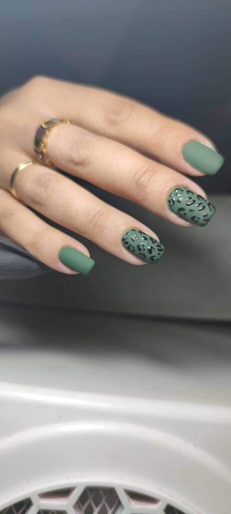 Sage nails with leopard spots in black and brown by nailbeautyguide
