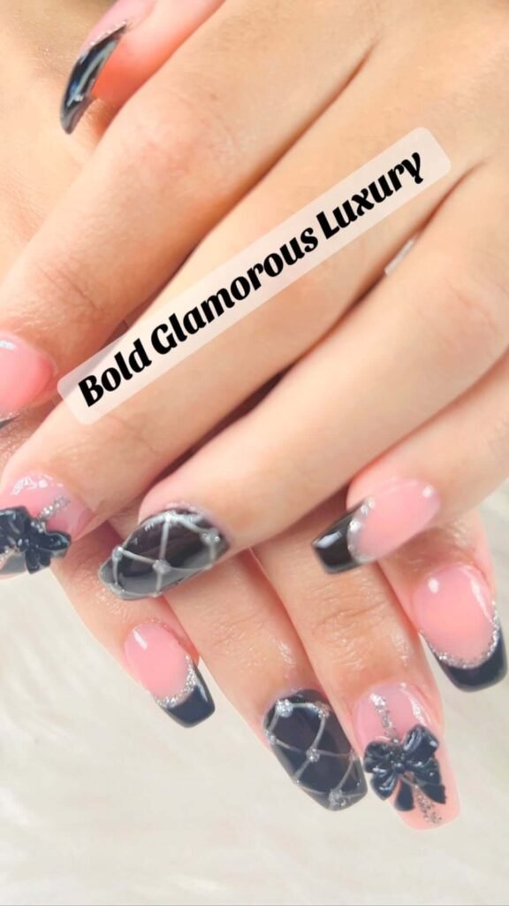 Square nails with black tips lined with silver glitter by fantasticnailsalonbrandonfl