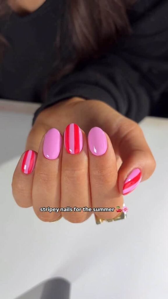 Striped nails styled with a minimalist background by thenaillologist
