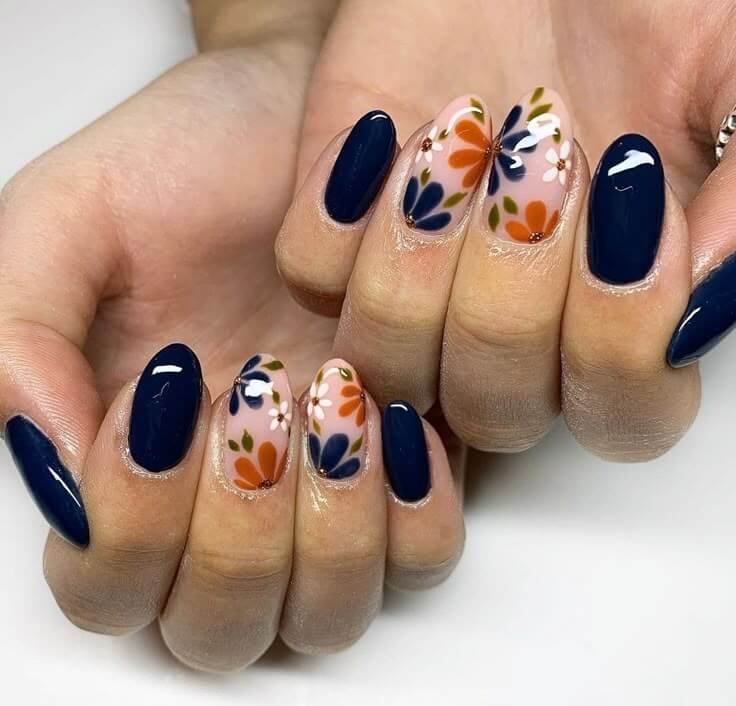 Twilight blue accent paired with caramel tones by nailbeautyguide