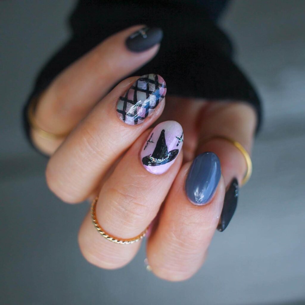 Witch hat and black cat Halloween nails by salemrosenails