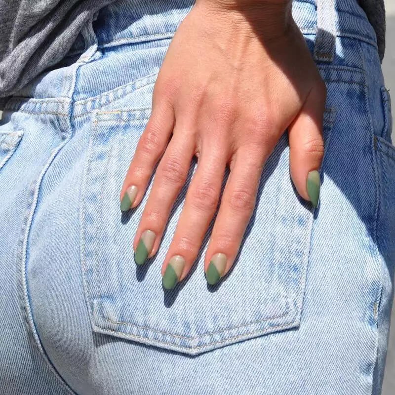 A manicure showcasing a dark, saturated deep English green polish by paintboxnails