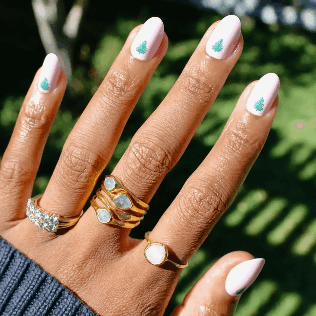 Baby Pink Manicure with Minimalist Christmas Tree Nail Art by oliveandjune