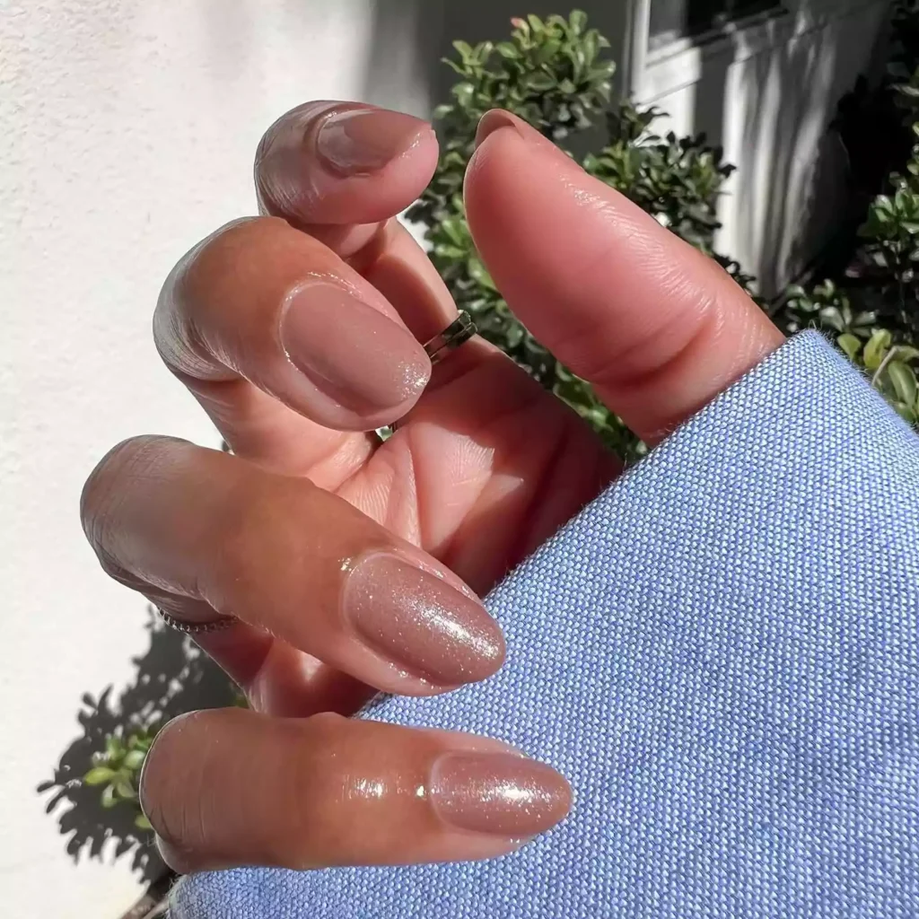 Frosted taupe and off-white nails with pearlescent shine by themaniclub