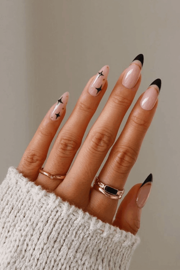 Glossy Black French Tips with Gold Star and Dot Accents by vivianmariewong