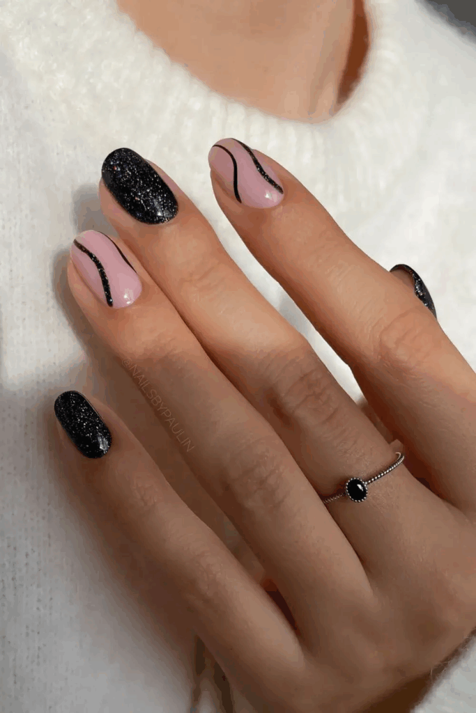 Glossy Black Nails with Subtle Silver Glitter Swirls by nailsbypaulin